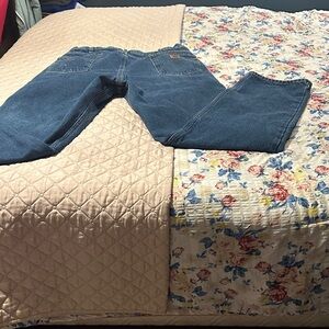 Carhartt Men's Bootcut Jeans in Blue. Flannel lined for the colder weather.